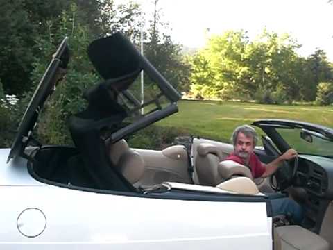 1999 Saab Convertible 9-3, top going down/up