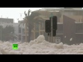 Sea foam fun: Cyclone turns Australian beach into bubble bath