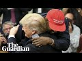 Kanye says 'I love this guy right here' as he walks over and gives Trump a hug
