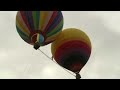 Tightrope walker sets high-wire record between hot air balloons