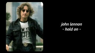 Watch John Lennon Hold On video