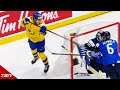 Sweden's Nils Hoglander pulls off a perfect lacrosse goal