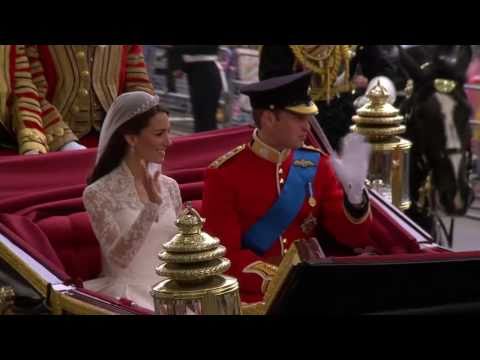 Celebration as the Royal Couple return to Buckingham Palace in a carriage 