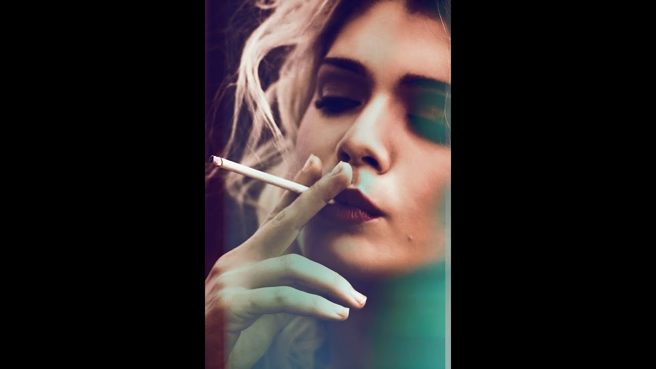 Doutzen Kroes smoking a cigarette (or weed)
