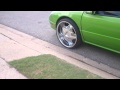 1999 Chrysler LHS sittin high on 24's with Candy Paint & Lambo Doors. Donk Status!!!