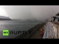 Freak snow storm swallows bridge in Siberia
