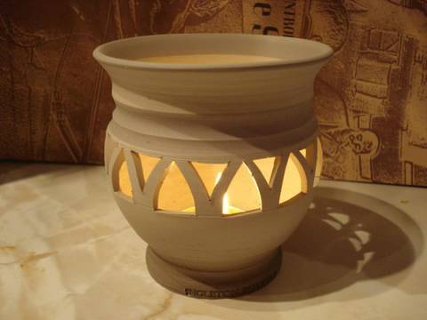 Piercing / carving a clay pottery candle holder / bowl pierced throwing