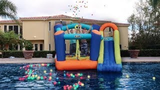 THROWING GIANT BOUNCY HOUSE IN THE POOL!!! **DON'T ATTEMPT**