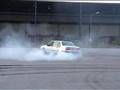 Blond bombshell burning rubber with a Volvo 940