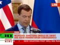 Obama and Medvedev speak on arms cuts deal after signing in Prague