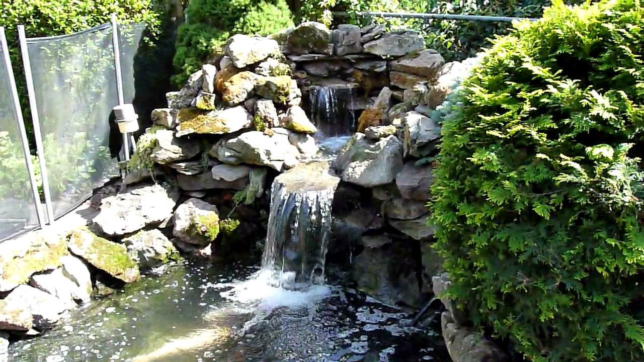 koi pond waterfall rebuild 2010 - YouTube
