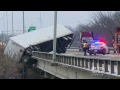 Big rig dangles from Dallas bridge