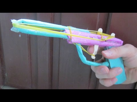 Как сделать пистолет из бумаги видео который стреляет резинками