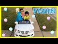 Kid Playing Outside riding car blowing bubbles with Giant Fro...