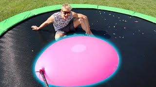 GIANT WATER BALLOON VS TRAMPOLINE!! GIANT WATER BALLOON VS TRAMPOLINE!!