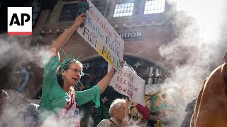 Protesters March Ahead Of New York Climate Week To Make Billionaires Pay