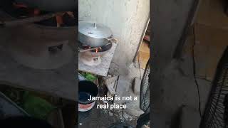 Only In Jamaica, When Your Gas Is Finished And You Want To Catch Your Coal Stove Fast Use A Fan Lol