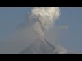 Mayon volcano's Christmas eve ash explosions and lava cascades