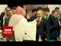 G20: Putin and Saudi crown prince high five - BBC News