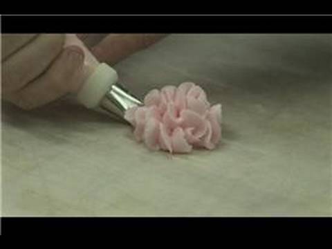 Ron demonstrate making of sugar orchids and wedding cake with edible blooms
