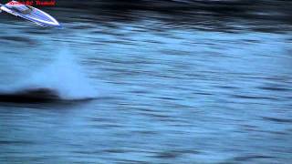 Traxxas Spartan does 2 1/2 rolls, flips and spills in slo mo