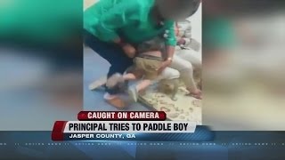 Principal Tries To Paddle Student