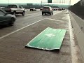 Highway sign falls during high winds