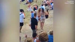Topless woman attacks man who 'groped' her at Rhythm & Vines music festival