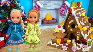 Christmas Gingerbread House Decorating! Elsa and Anna toddler dolls! Candy -Icing -Fun kids video
