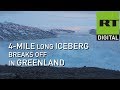 Enormous iceberg filmed breaking from Greenland glacier