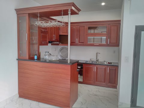 Mẫu tủ bếp gỗ xoan đào Hoàng Anh kèm quầy bar sang trọng nhà anh Sỹ - Hải Phòng | NỘI THẤT HPRO