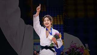 A Female Judoka Is Very Happy To Receive A D Medal