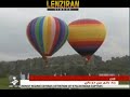 Chinese acrobat walk between two flying balloons  to enter Guiness book of a records !