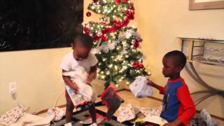 Zay Zay and Jojo open Christmas presents