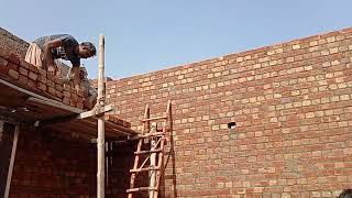 A Young Boy Throwing Bricks