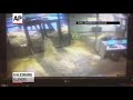 Raw: Flood Waters Crash Through College Campus