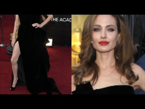 Angelina Jolie shows a leg at