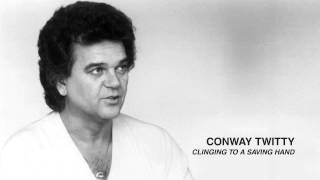 Watch Conway Twitty Clinging To A Saving Hand video