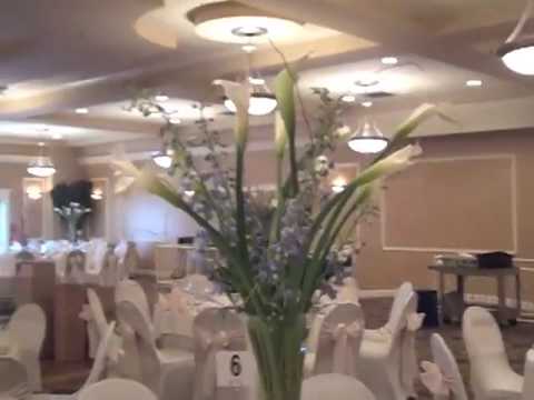 table centerpieces with calla lilies hybrid delphinium curly willow