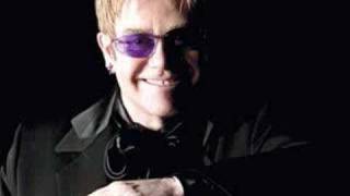 Watch Elton John The Muse video