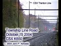 CSX K650 Tropicana Orange Juice train in the rain