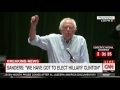 Bernie Sanders supporters boo loudly when he says they must e...