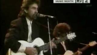 Watch George Harrison Here Comes The Sun video