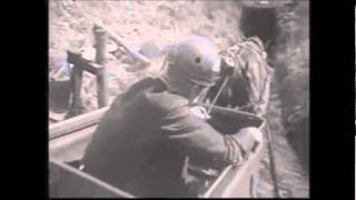Watch Devo Working In A Coal Mine video