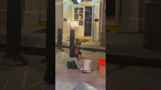 Drummer Girl Playing On Buckets Street Music In New Orleans
