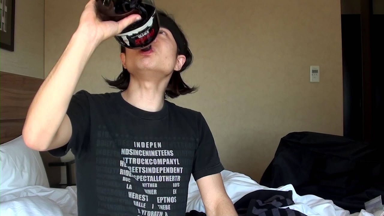 Chugs soda then burps