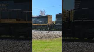 4 Locomotive Consist With Some Empty Coal Hoppers.