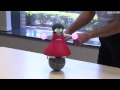 Robots Dance in Synchronization While Balancing on Balls