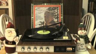 Watch Buck Owens Here Comes Santa Claus Again video