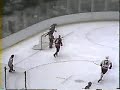 Billy Smith highsticks Lindy Ruff in the eye